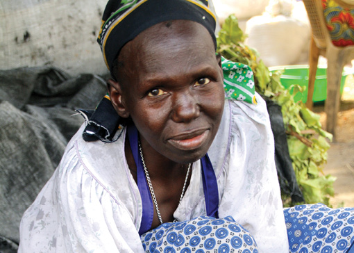 A small loan helped this woman in Juba, South Sudan, increase the productivity of her business selling charcoal. She is a microinsurance client of Finance South Sudan Ltd, a grantee of MicroLead, the LDC Fund to Develop Savings-led Market Leaders for Inclusive Finance. Through this global UNCDF initiative, microfinance institutions have served some 236,000 depositors and 61,000 borrowers as of 2012. © Emma Kandelaars/Finance South Sudan Ltd