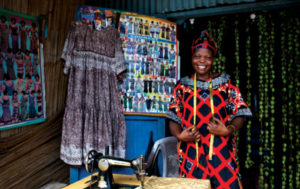 In Juba town in South Sudan, a client of Finance South Sudan Limited, one of MicroLead’s grantees, has been able to increase her tailoring works and income as a result of loans. ©