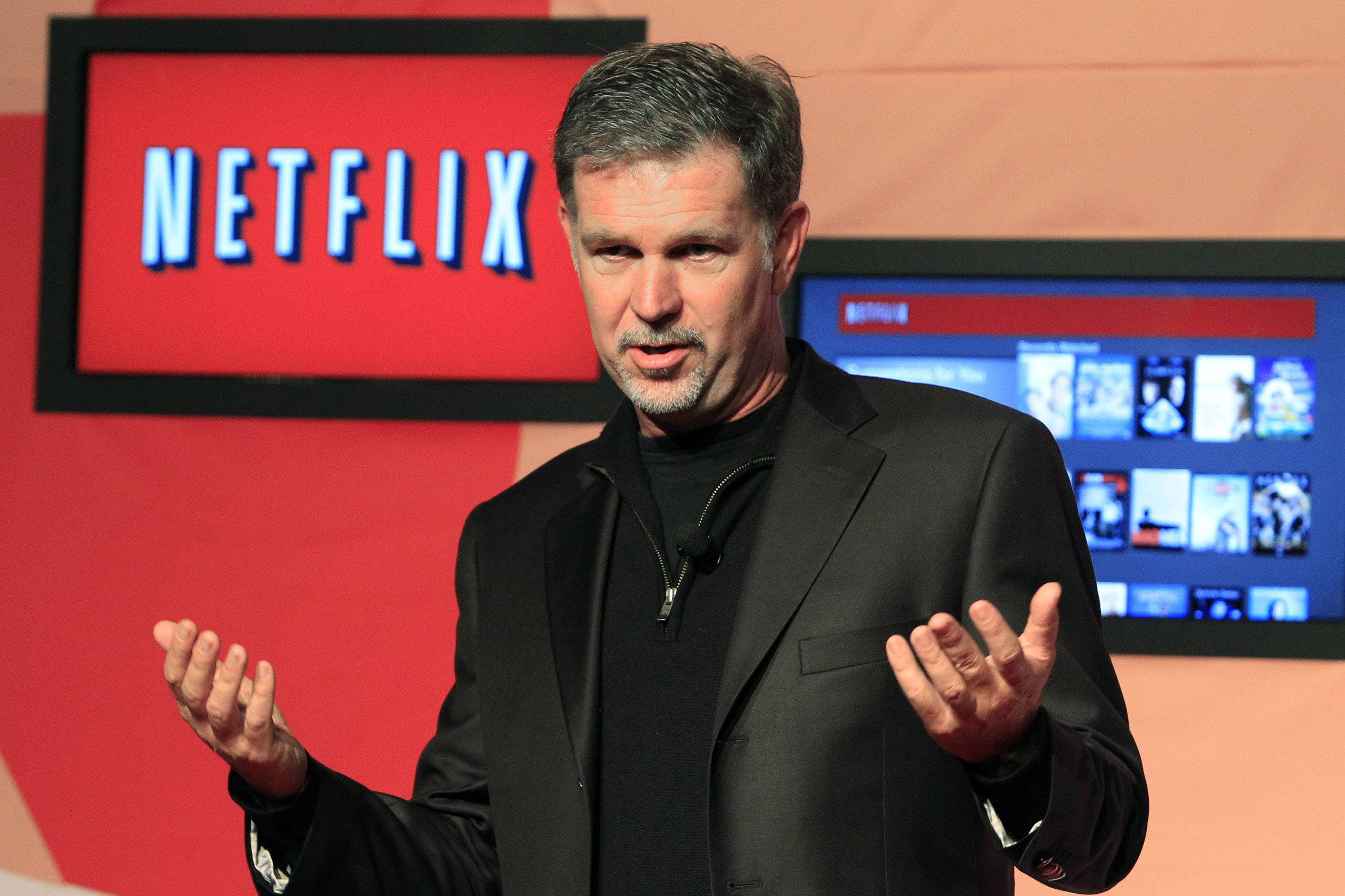 Netflix Chief Executive Officer Reed Hastings speaks during the launch of streaming internet subscription services for movies and television shows to televisions and computers in Canada, at a news conference in Toronto September 22, 2010. The Canadian introduction marks the first availability of the Netflix service outside of the U.S. REUTERS/ Mike Cassese (CANADA - Tags: BUSINESS SCI TECH)