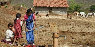 India - Women Pumping Water