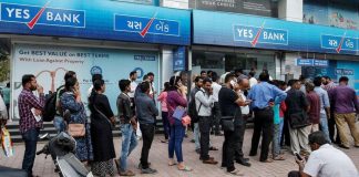 Queue outside a branch of Yes Bank