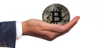Hand holding Bitcoin, giving, donation, charity