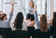 Female speaker, training class, skills gap