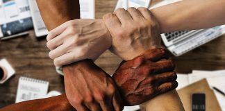 Social investment. Diversity, inclusion. Hands linked, ethnicity