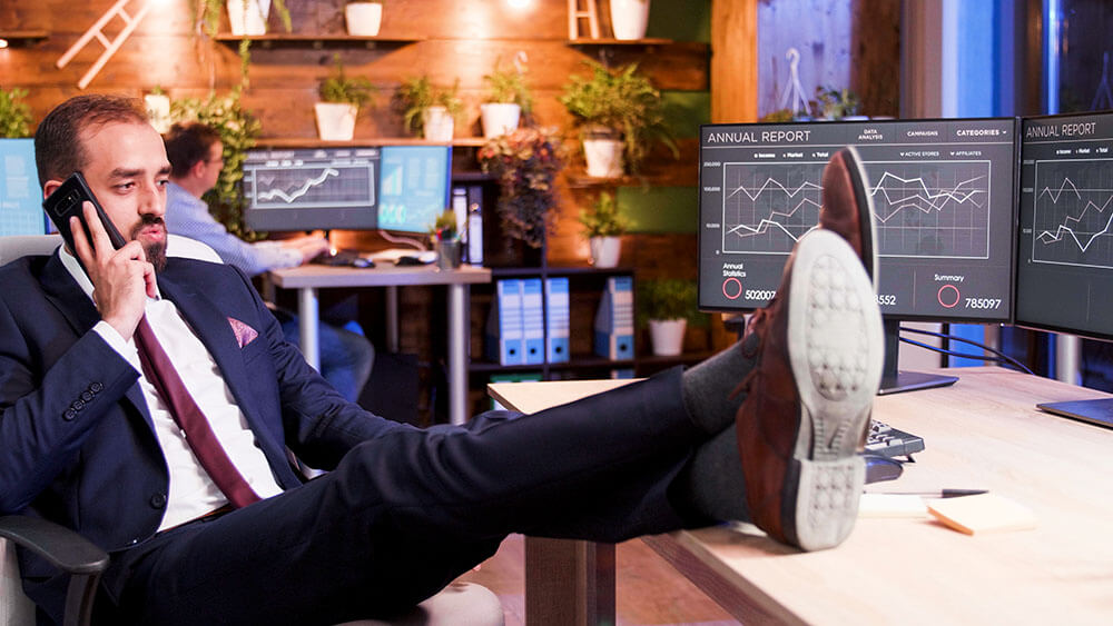 Office worker with feet on desk - Quiet quitting