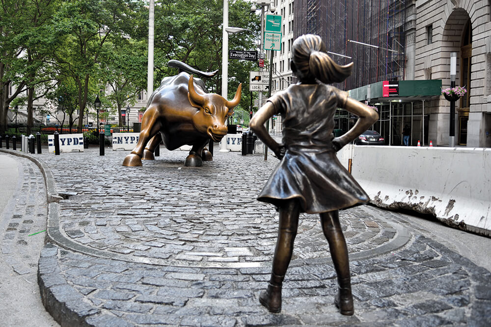 Wall St bull and girl statue, New York