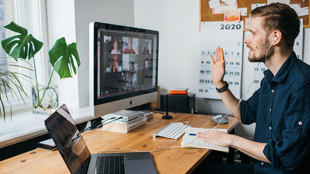 Man working from home, video conference, Zoom