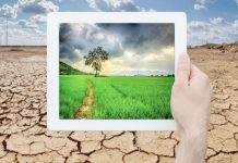 Climate tech: tablet with drought landscape background