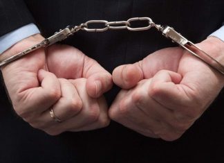 Businessman in handcuffs. Covid scheme fraud illustration