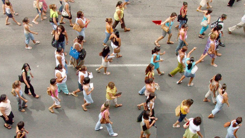 Aerial view of people walking, reducing scope 4 emissions