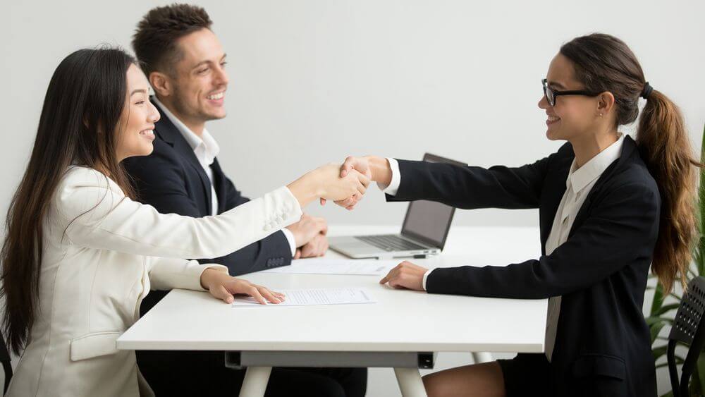 Job interview, people shaking hands