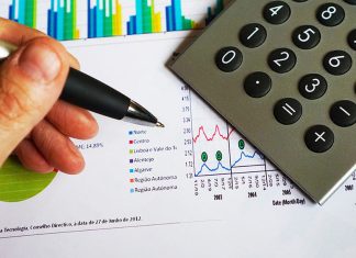Calculator, charts, economic data illustration