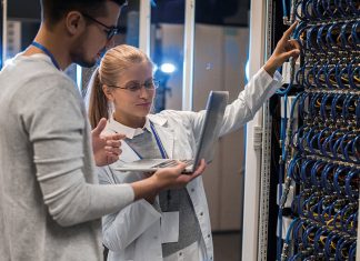 IT, man, woman, laptop, patch cabinet